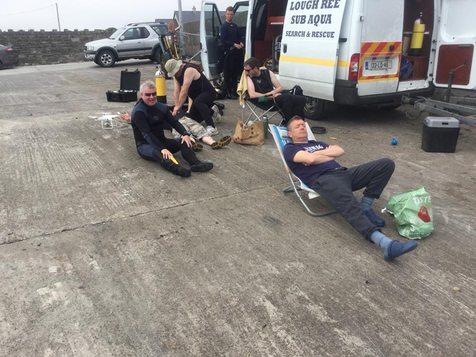 Club members preparing kit near the rescue van