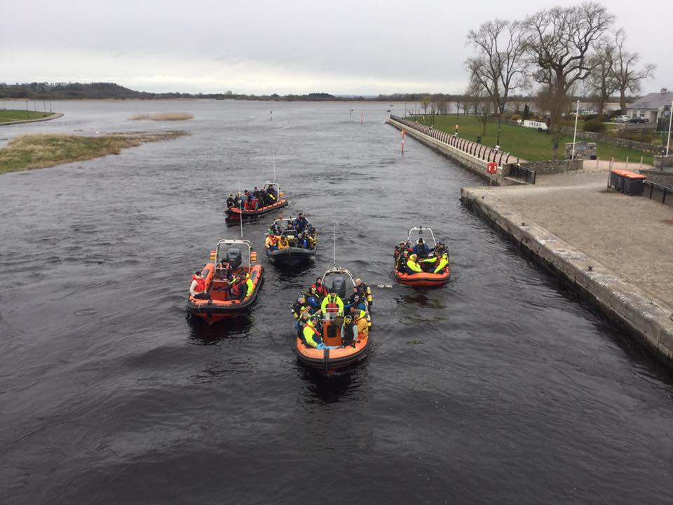 Club members gathered in RIBs on the water