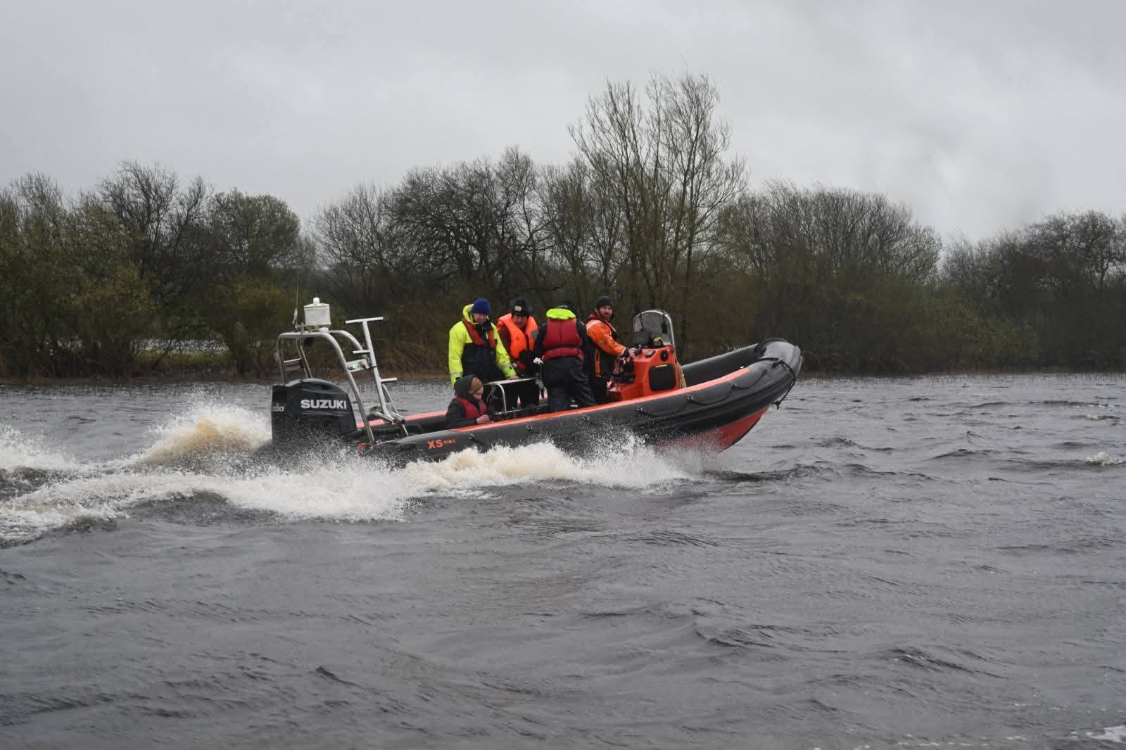 Rescue boat underway on rough water