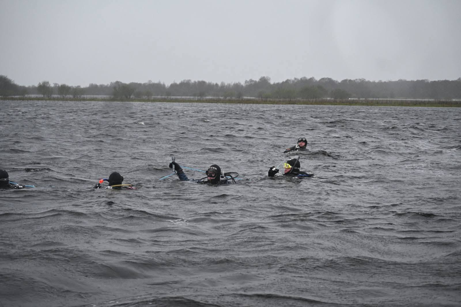 Divers in open water during training
